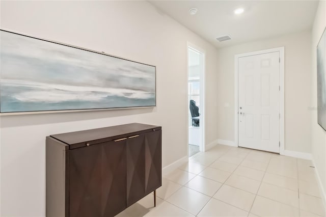 17461 Back Bay Ct, Clermont, FL 34714 - foyer entrance featuring baseboards and light tile patterned floors