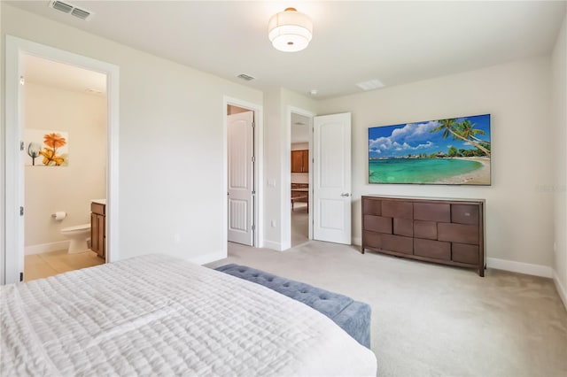 17461 Back Bay Ct, Clermont, FL 34714 - bedroom with ensuite bath and light colored carpet