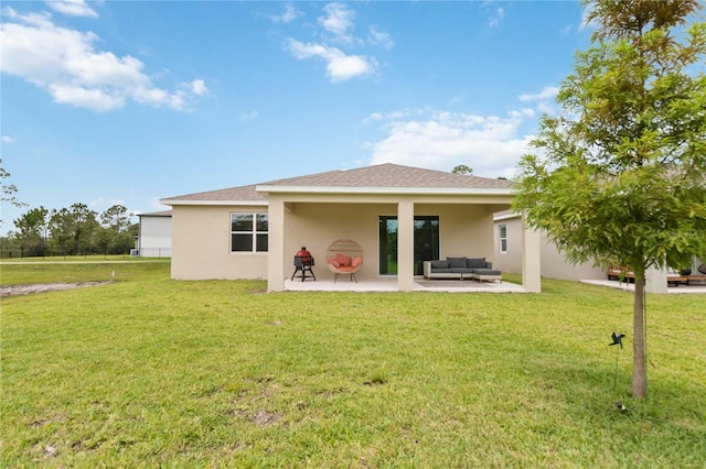 17461 Back Bay Ct, Clermont, FL 34714 - rear view of property featuring outdoor lounge area, stucco siding, a patio, and a yard
