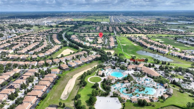 1406 Deuce Cir, Champions Gate, FL 33896 - aerial view of property and surrounding area with a nearby body of water and nearby suburban area