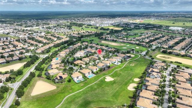 1406 Deuce Cir, Champions Gate, FL 33896 - aerial view of property's location featuring nearby suburban area and a local golf course