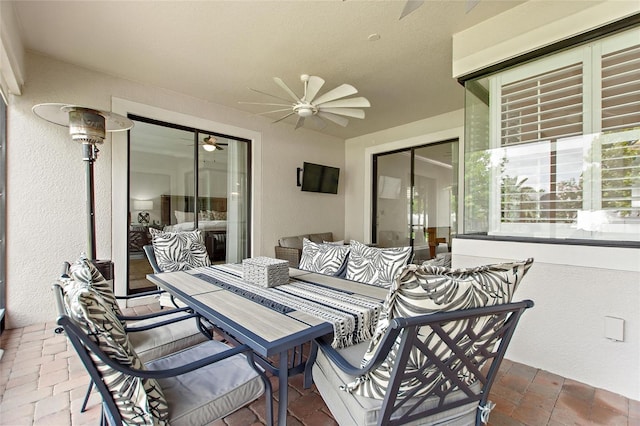 1406 Deuce Cir, Champions Gate, FL 33896 - view of patio featuring ceiling fan and an outdoor hangout area