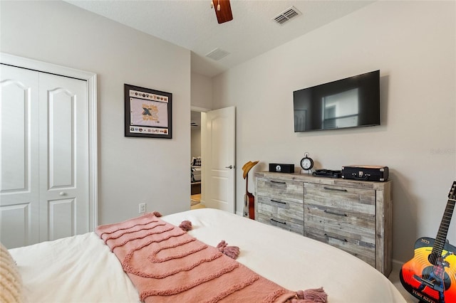 1406 Deuce Cir, Champions Gate, FL 33896 - bedroom with a closet and a ceiling fan