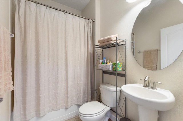 1406 Deuce Cir, Champions Gate, FL 33896 - full bathroom with toilet and shower / tub combo with curtain