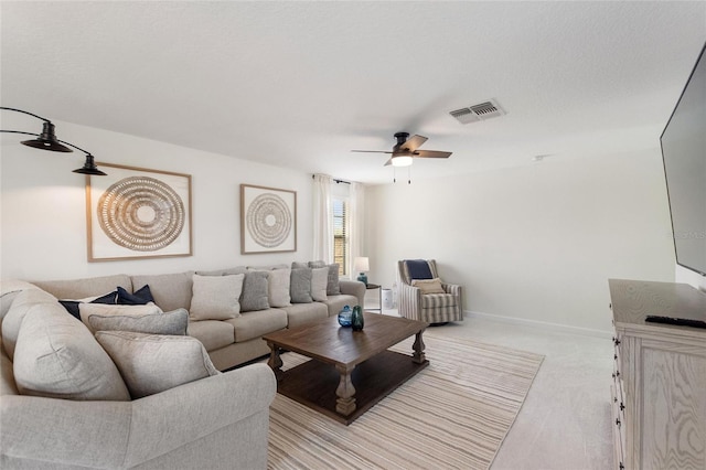 1406 Deuce Cir, Champions Gate, FL 33896 - living area featuring ceiling fan and light carpet