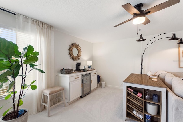 1406 Deuce Cir, Champions Gate, FL 33896 - home office featuring wine cooler, a dry bar, light carpet, and ceiling fan