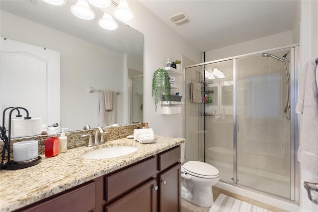 1406 Deuce Cir, Champions Gate, FL 33896 - bathroom featuring vanity, a shower stall, and tile patterned floors