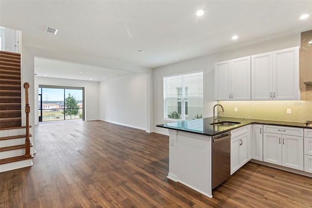 2604 Pinnacle, Clermont, FL 34711 - kitchen featuring dishwasher, a peninsula, backsplash, dark wood-style floors, and recessed lighting