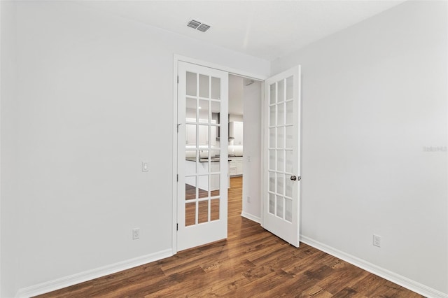 2604 Pinnacle, Clermont, FL 34711 - unfurnished room featuring french doors and wood finished floors