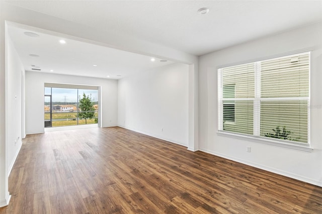 2604 Pinnacle, Clermont, FL 34711 - empty room with wood finished floors and recessed lighting