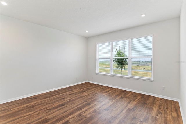 2604 Pinnacle, Clermont, FL 34711 - spare room with dark wood finished floors and recessed lighting