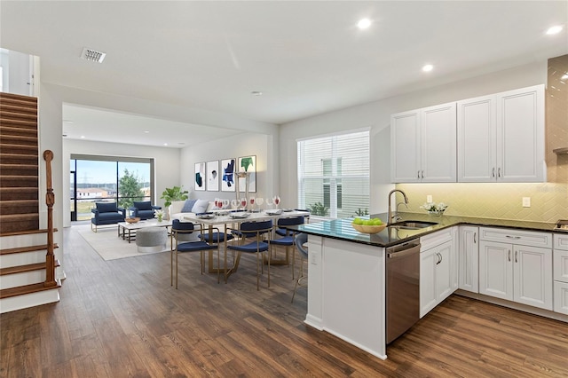 2604 Pinnacle, Clermont, FL 34711 - kitchen featuring dishwasher, a peninsula, dark wood-style flooring, open floor plan, and recessed lighting