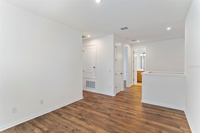 2604 Pinnacle, Clermont, FL 34711 - unfurnished room with wood finished floors and recessed lighting