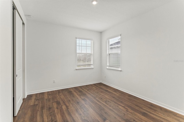 2604 Pinnacle, Clermont, FL 34711 - unfurnished bedroom with dark wood finished floors and a closet