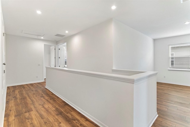 2604 Pinnacle, Clermont, FL 34711 - corridor featuring an upstairs landing, wood finished floors, and recessed lighting