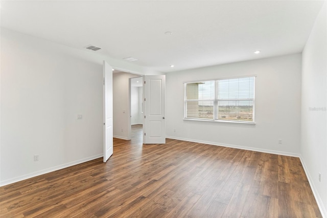 2604 Pinnacle, Clermont, FL 34711 - spare room with dark wood finished floors and recessed lighting