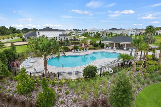 2604 Pinnacle, Clermont, FL 34711 - community pool with a residential view and a patio