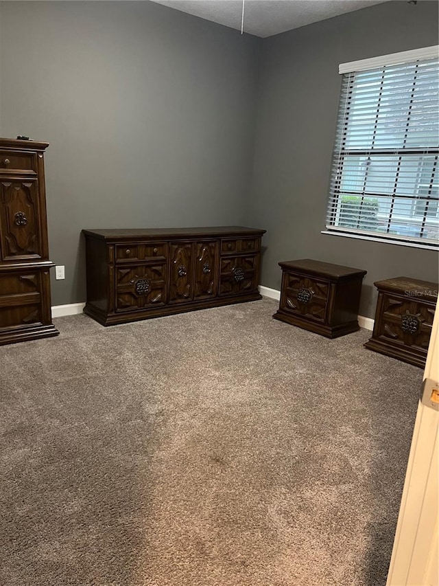 8512 Player Point Dr, Davenport, FL 33896 - carpeted bedroom with baseboards