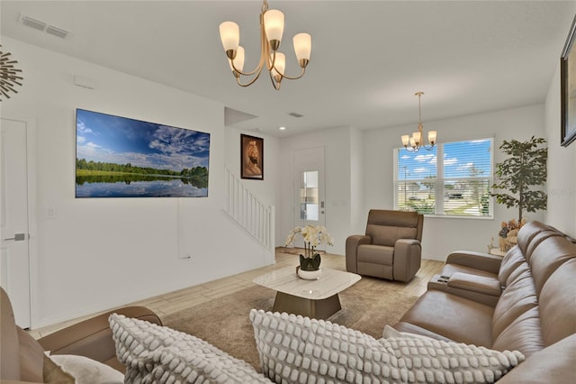 2912 Sanctuary Dr, Clermont, FL 34714 - living area with a chandelier and stairs