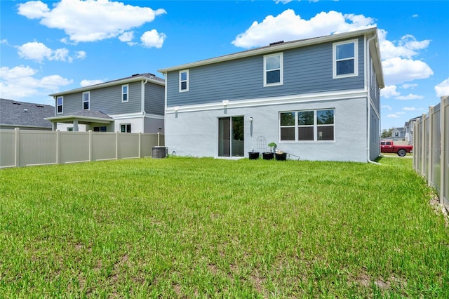 2912 Sanctuary Dr, Clermont, FL 34714 - back of property with stucco siding