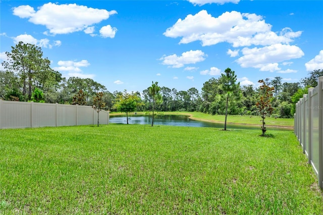 2912 Sanctuary Dr, Clermont, FL 34714 - view of yard featuring a water view and view of wooded area
