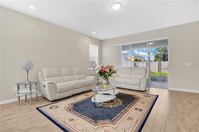 1564 Atlantic Coastline Loop, Oakland, FL 34787 - living area featuring wood finished floors and recessed lighting
