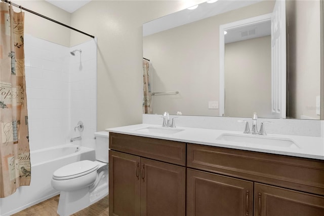 1564 Atlantic Coastline Loop, Oakland, FL 34787 - bathroom featuring double vanity, shower / tub combo with curtain, and wood finished floors