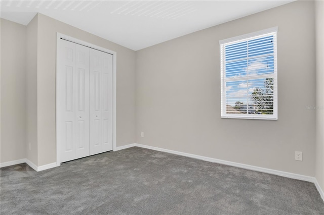 1564 Atlantic Coastline Loop, Oakland, FL 34787 - unfurnished bedroom with carpet and a closet
