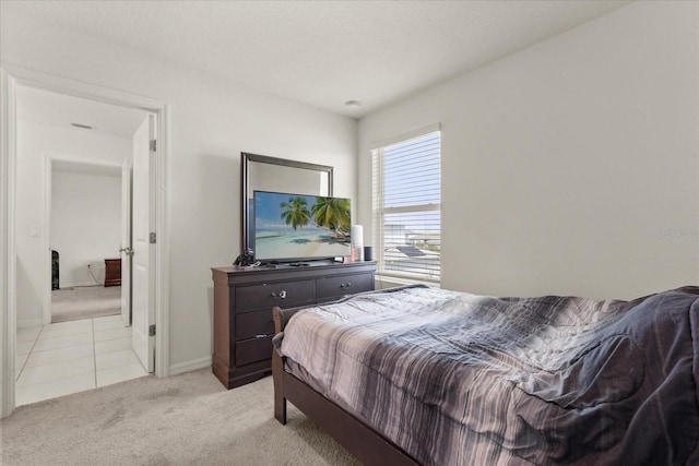 384 Quarry Rock Cir, Kissimmee, FL 34758 - bedroom featuring light carpet and light tile patterned floors