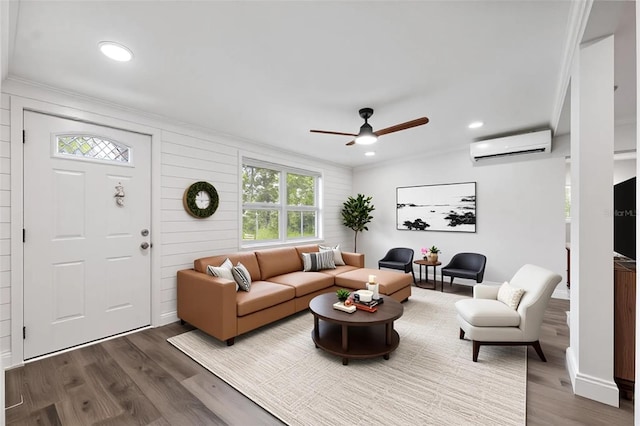 4505 Cottonwood Dr, New Port Richey, FL 34652 - living area with a wall mounted air conditioner, ceiling fan, crown molding, dark wood-style floors, and recessed lighting