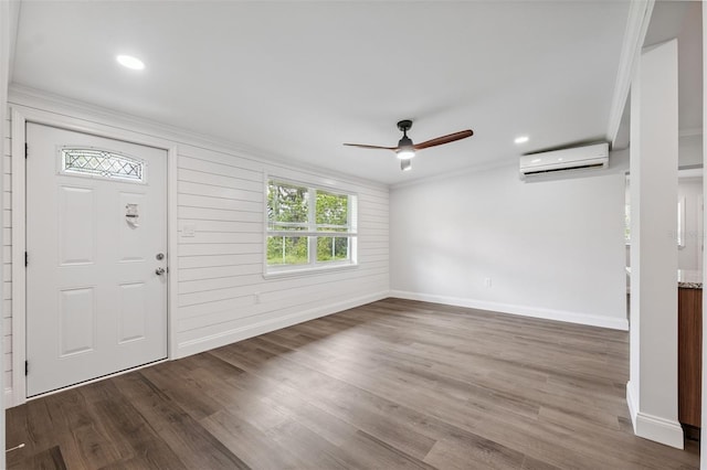 4505 Cottonwood Dr, New Port Richey, FL 34652 - entrance foyer featuring a wall unit AC, ceiling fan, ornamental molding, dark wood-style flooring, and recessed lighting