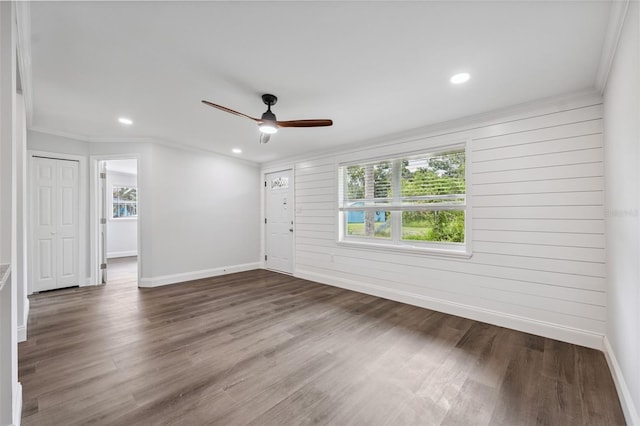 4505 Cottonwood Dr, New Port Richey, FL 34652 - empty room with crown molding, plenty of natural light, a ceiling fan, wood finished floors, and recessed lighting