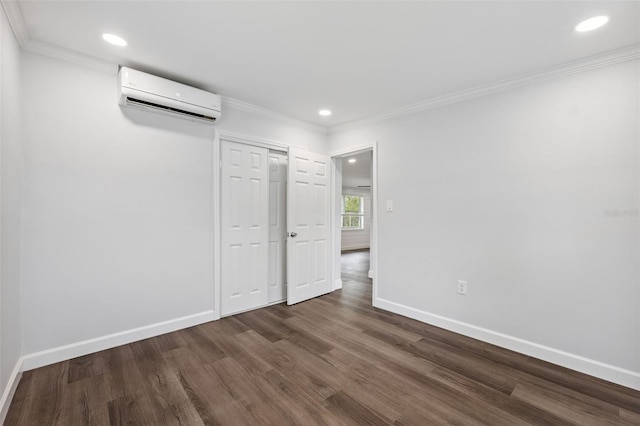 4505 Cottonwood Dr, New Port Richey, FL 34652 - unfurnished bedroom with a wall mounted AC, dark wood-type flooring, recessed lighting, ornamental molding, and a closet