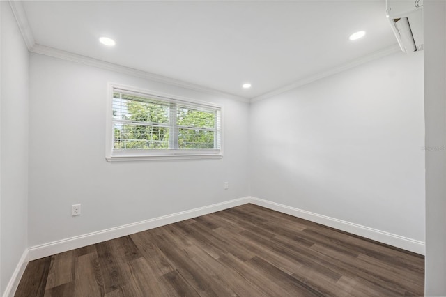 4505 Cottonwood Dr, New Port Richey, FL 34652 - empty room with dark wood finished floors, crown molding, and recessed lighting