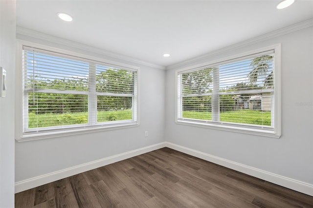 4505 Cottonwood Dr, New Port Richey, FL 34652 - empty room with crown molding, dark wood-style flooring, and recessed lighting