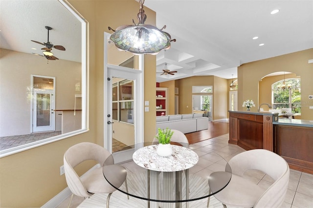 32 Allenwood Look, Ormond Beach, FL 32174 - dining room featuring ceiling fan, recessed lighting, light tile patterned floors, and arched walkways