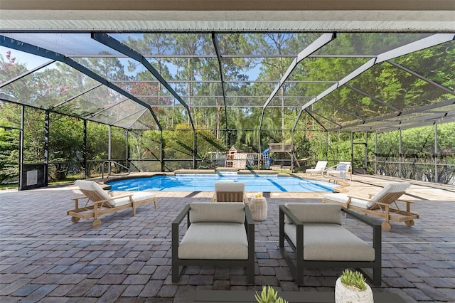 32 Allenwood Look, Ormond Beach, FL 32174 - swimming pool featuring a patio area and glass enclosure