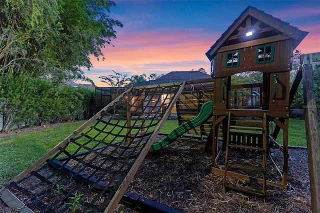 32 Allenwood Look, Ormond Beach, FL 32174 - playground at dusk with a playground and a fenced backyard