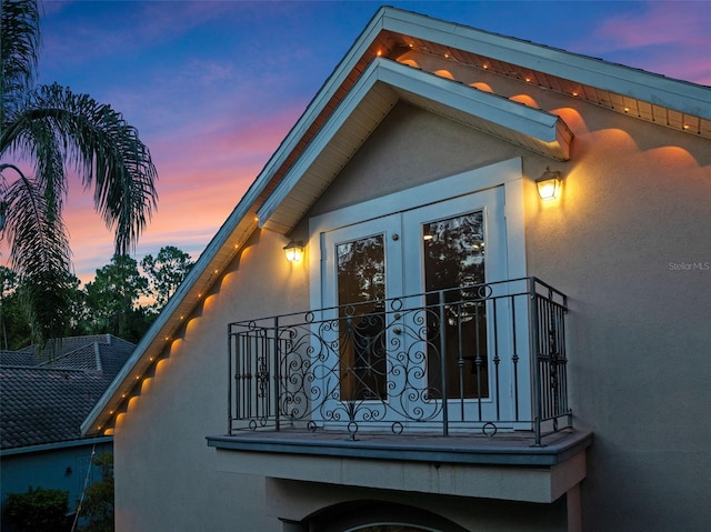32 Allenwood Look, Ormond Beach, FL 32174 - view of property exterior featuring stucco siding and french doors
