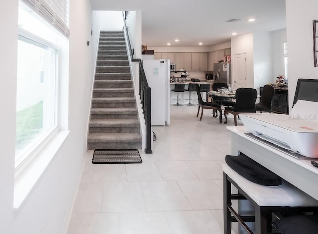 4152 Pino St, Apopka, FL 32712 - stairway with tile patterned flooring and recessed lighting