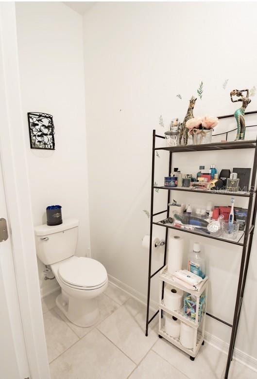 4152 Pino St, Apopka, FL 32712 - bathroom featuring toilet and baseboards