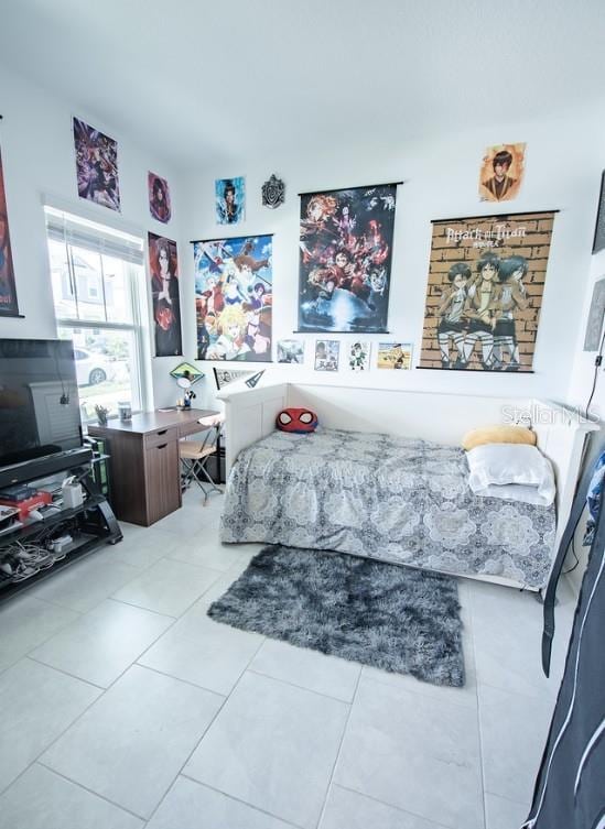 4152 Pino St, Apopka, FL 32712 - tiled bedroom featuring a desk