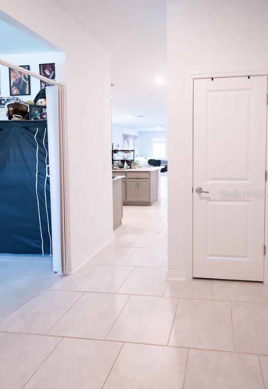 4152 Pino St, Apopka, FL 32712 - hallway with light tile patterned floors