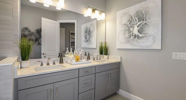 858 Arbor Green Trl, Saint Cloud, FL 34771 - full bath featuring double vanity and baseboards