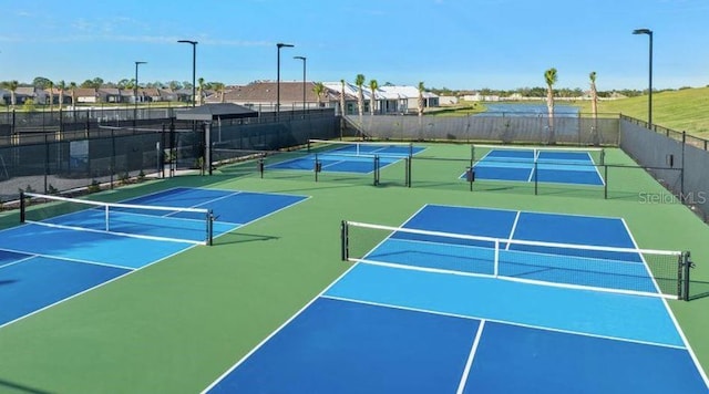 858 Arbor Green Trl, Saint Cloud, FL 34771 - view of tennis court featuring a residential view and community basketball court