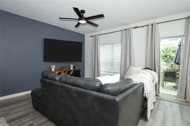 2326 Carrabelle Way, Sanford, FL 32771 - living area with plenty of natural light, wood finished floors, and a ceiling fan