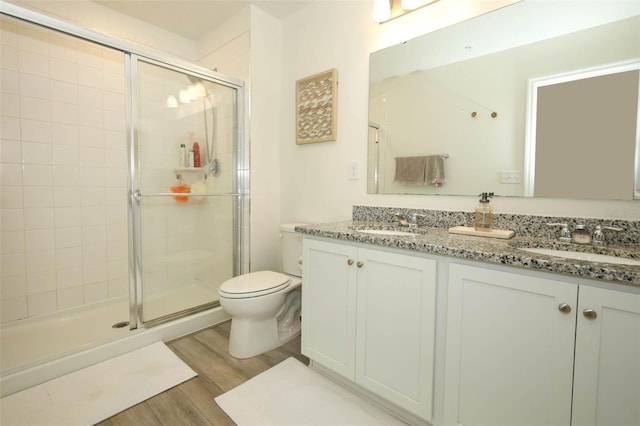 2326 Carrabelle Way, Sanford, FL 32771 - full bath featuring double vanity, a shower stall, and wood finished floors
