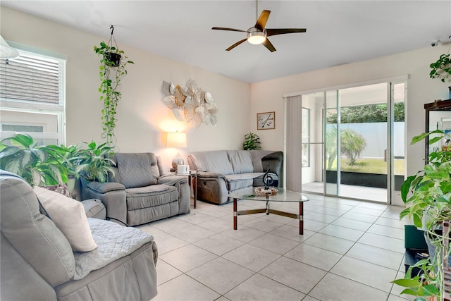 480 Kestrel Dr, Groveland, FL 34736 - living area featuring ceiling fan and light tile patterned flooring