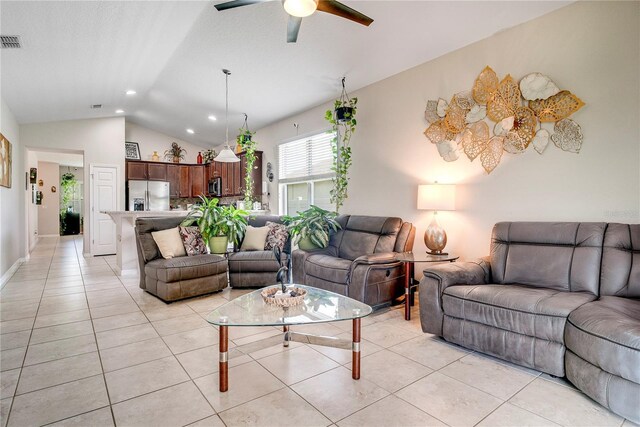480 Kestrel Dr, Groveland, FL 34736 - living room with lofted ceiling, light tile patterned floors, ceiling fan, and recessed lighting