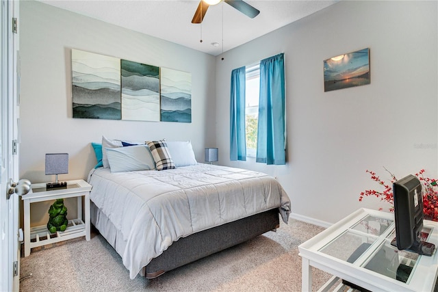 480 Kestrel Dr, Groveland, FL 34736 - carpeted bedroom with baseboards and ceiling fan